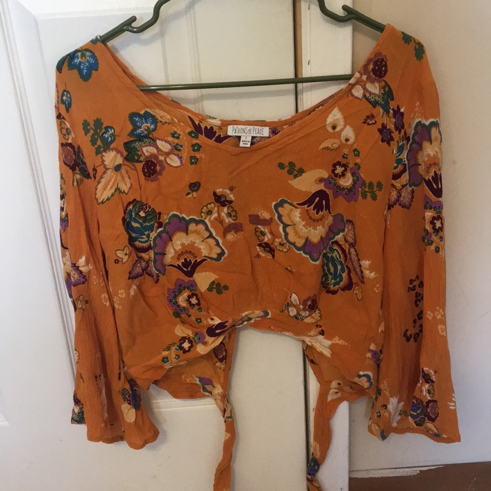 Patrons of Peace Wrap Top